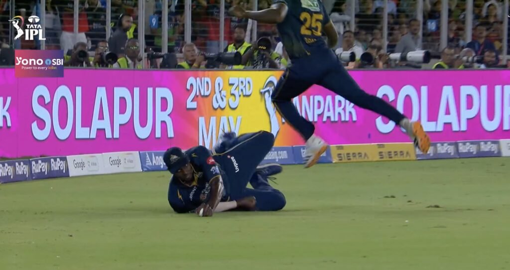 Jason Holder took a magnificent catch to dismiss Rajat Patidar, sparking debate whether the catch is legal or not